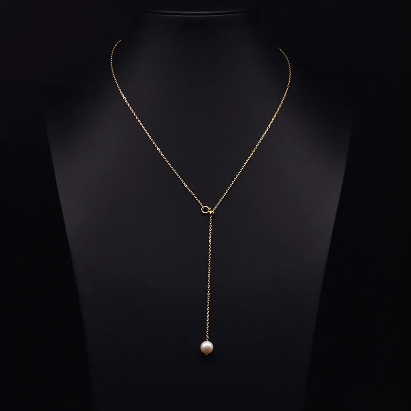 Long simple pearl necklace