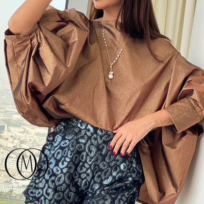 بلوزة كبيرة الحجم
