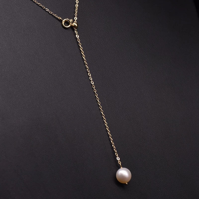 Long simple pearl necklace