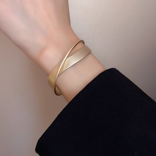 Cross bangle