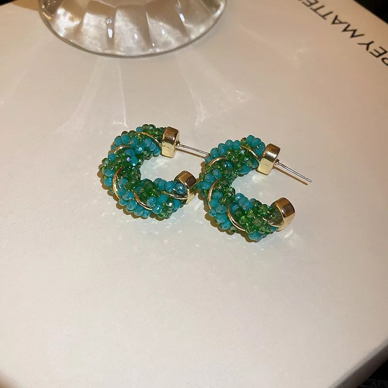 Green c shape earrings