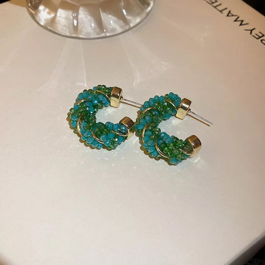 Green c shape earrings